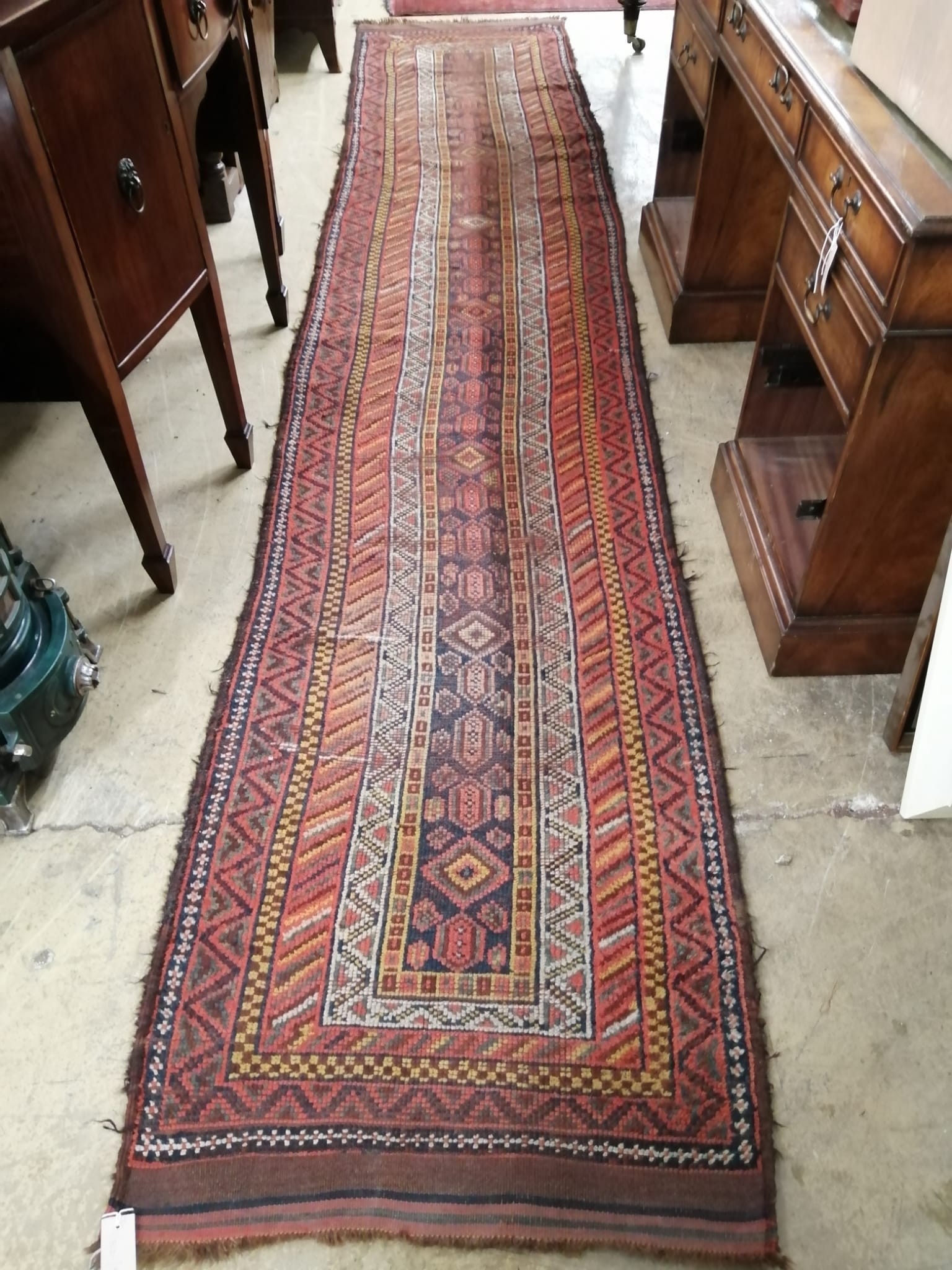 A Turkish polychrome wool runner, 420 x 80cm